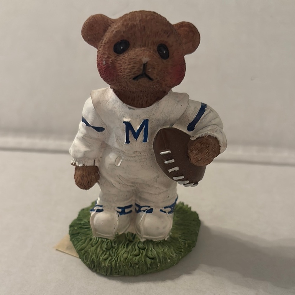 University of Ole Miss Rebels collectible, mini mascot, holding football